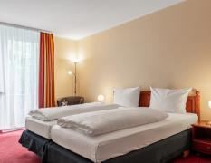 Helles Doppelzimmer als Beispiel im INVITE Hotel an der Kaiserburg